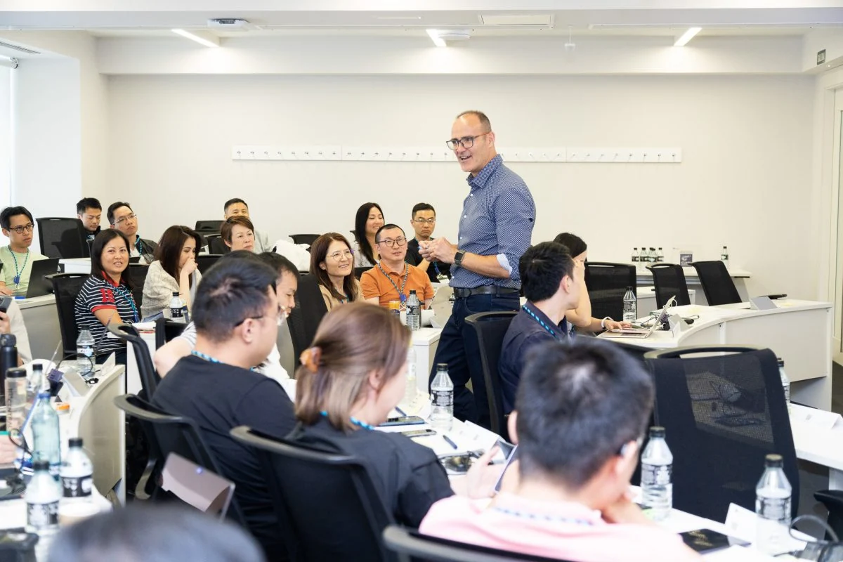 CUHK EMBA participants listening to an instructor during their 2024 study trip to IE Business School in Spain.
